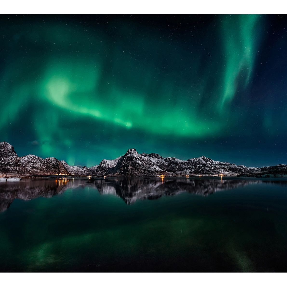 Northern Lights Serenity: Aurora Illuminating Dark Rocks & Water Wall Mural