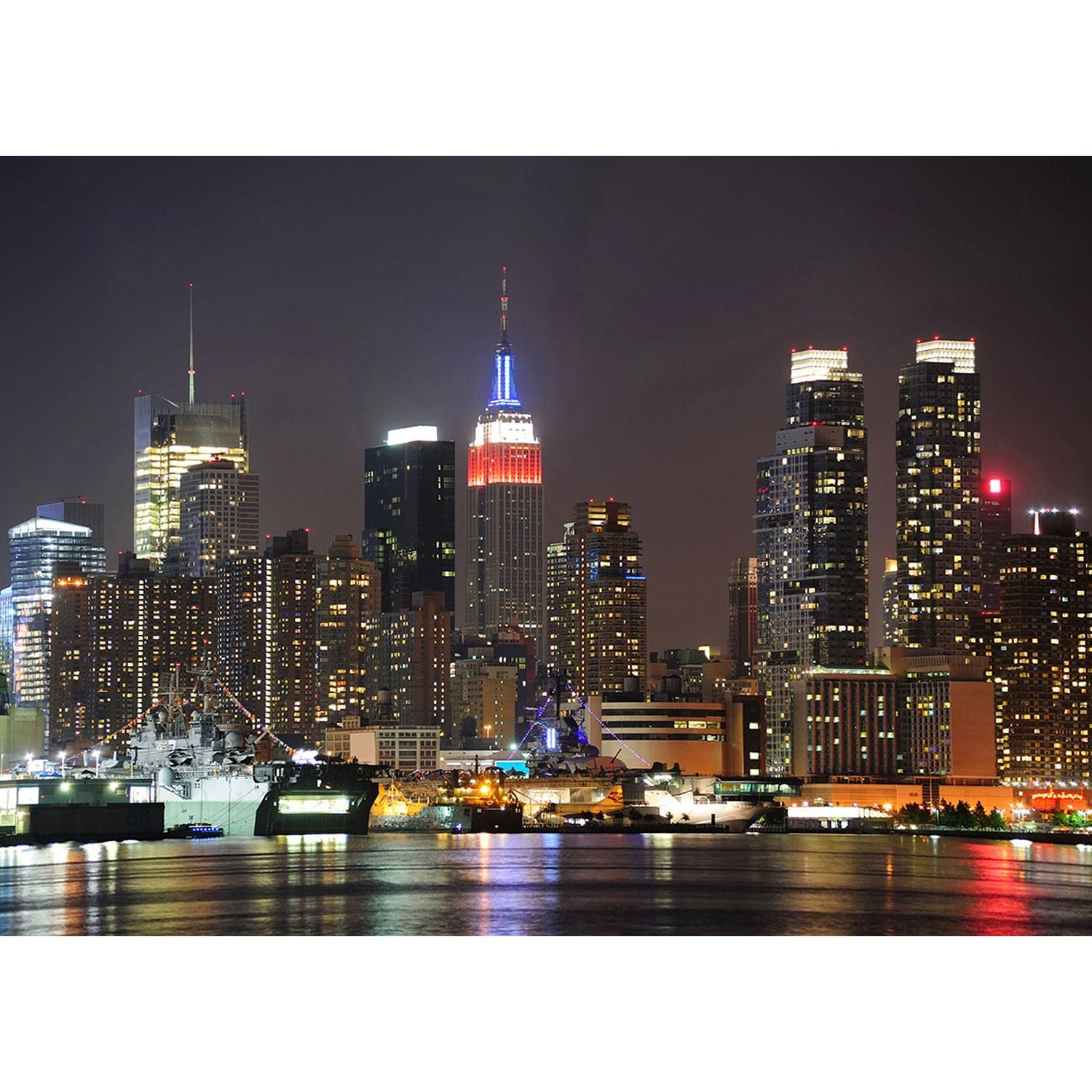 City Lights Majesty: New York Skyline at Night Wall Mural