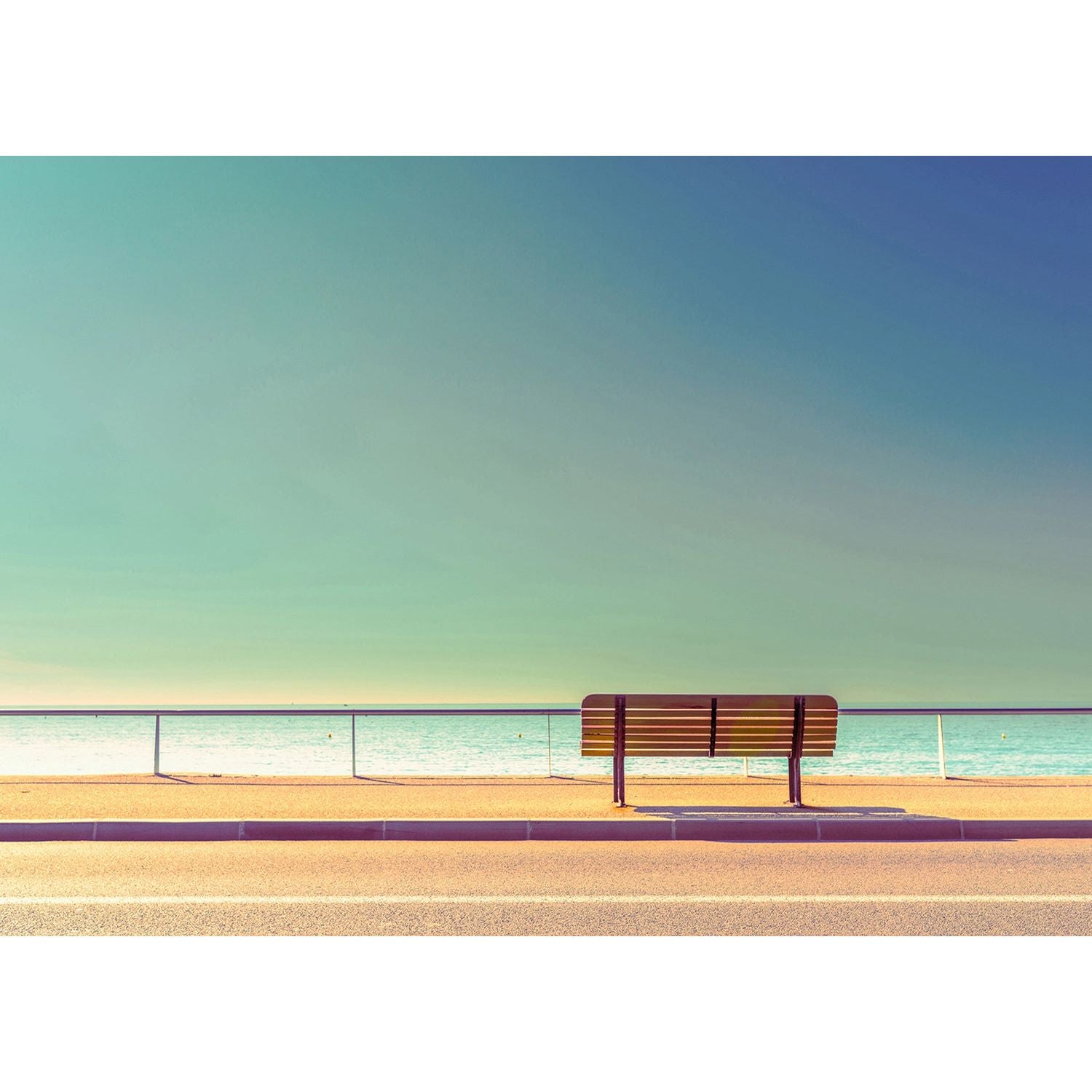 Seaside Serenity: Bench by the Calm Sea Wall Mural
