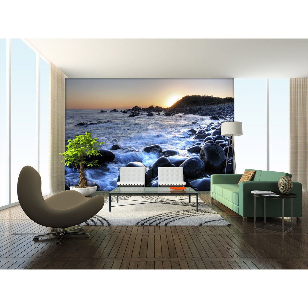 Coastal Erosion: Wave-Washed Rocks Wall Mural